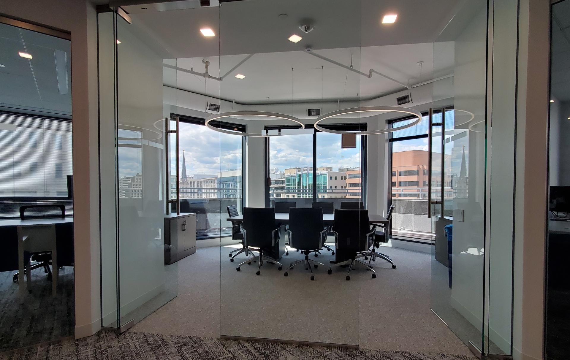 Natural light and glass partitions enhance teaming space